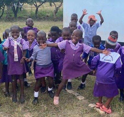 Preschool Children Jumping for Joy