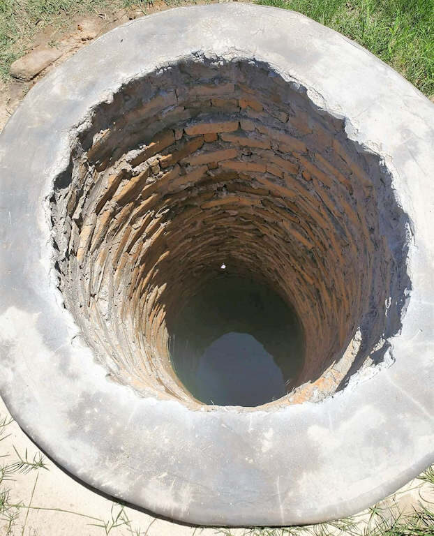 PICTURE OF WELL HOLE